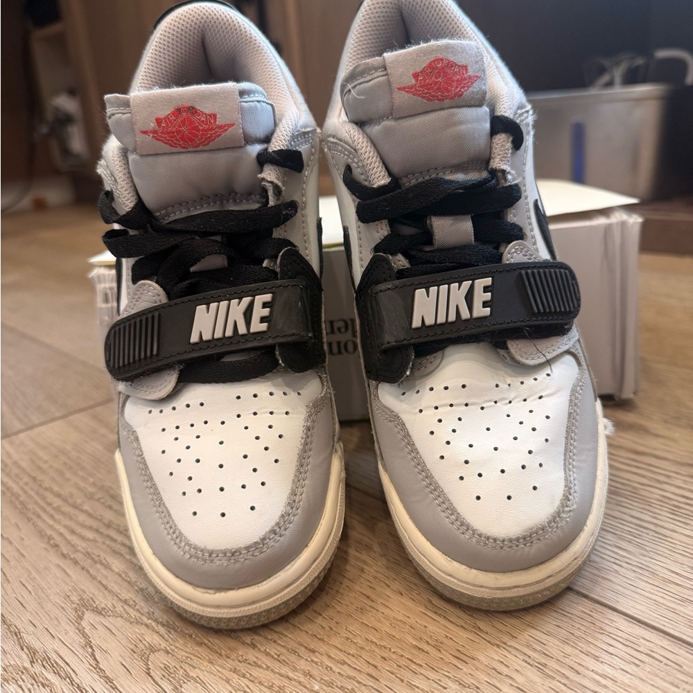Nike air Jordans - Kids 4. White, Gray & Black Sneakers with Red Logo